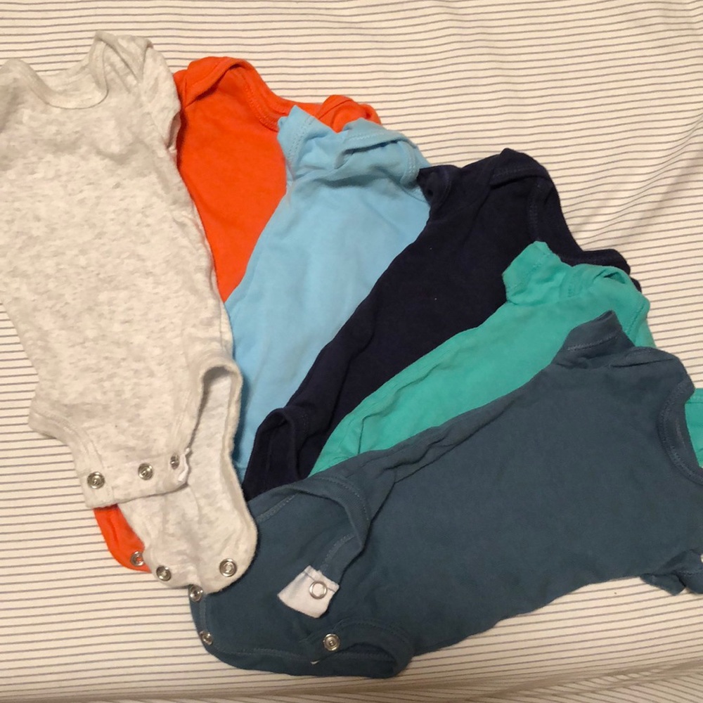 Never worn premie onesies